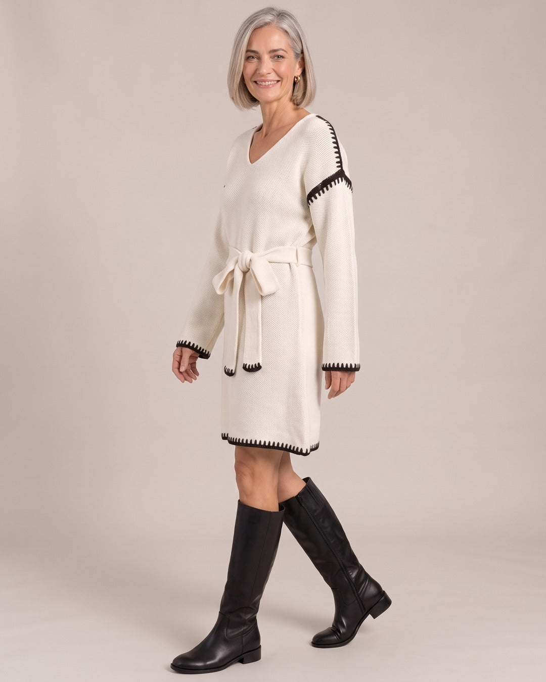 V-Neck Knit Sweater Dress with Waist Belt worn by a model, side view, White