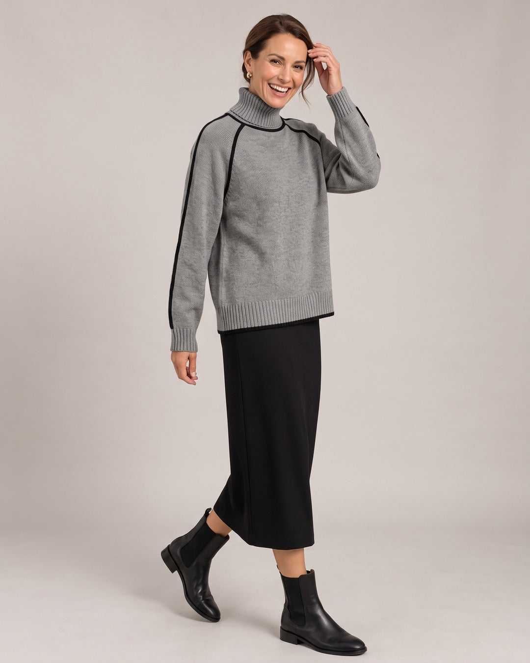 Roll-Neck Knit Jumper worn by a model